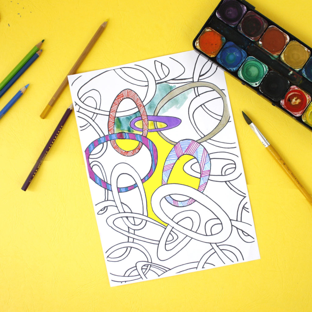 relaxing with a patterned zen colouring sheet 