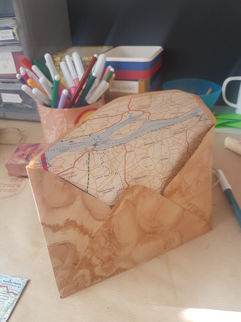 line your handmade envelopes with old map pages 